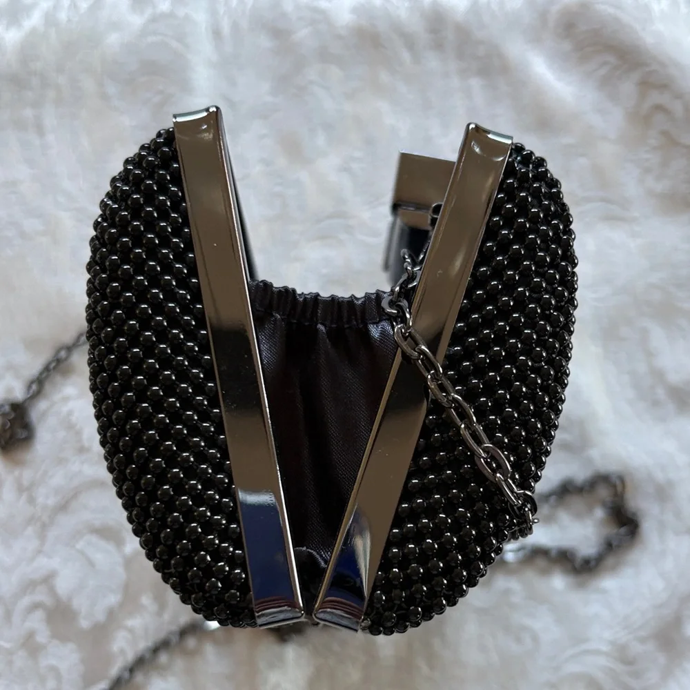 Black Beaded Clutch by Jessica McClintock